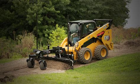 rough grading with a skid steer|skid steer grading techniques.